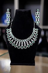 American zercon with emeralds stones in sterling silver
