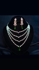 Emeralds with American zercon in sterling silver.